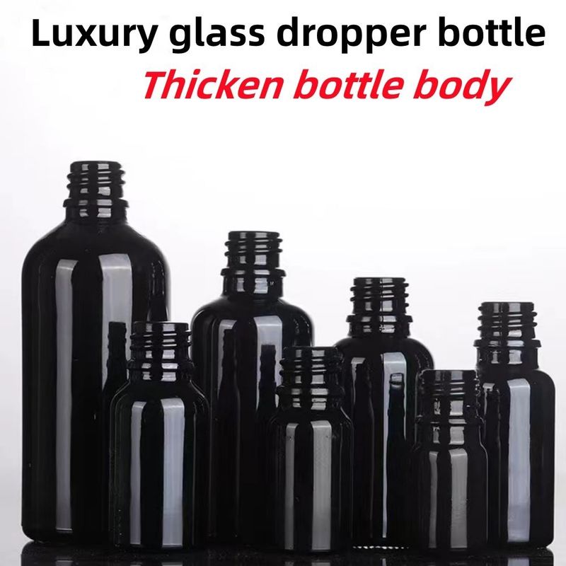 Schwarz 10, Ml 15ml 20ml 30ml 50ml leere, runde, schwarze, glänzende Glas-Tropffflasche für ätherisches Öl mit Kunststoff-Goldring