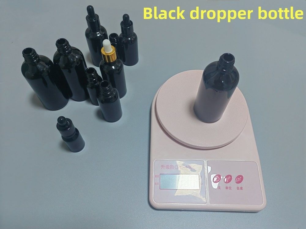 5 ml 10 ml 15 ml 20 ml ätherisches Öl Serum Flat Shoulder Round Glänzende ätherische Ölflasche Schwarzes Glas Tropffflasche